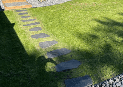 front yard stone walking path created by Lush Landscaping and restration ltd in Edmonton Canada