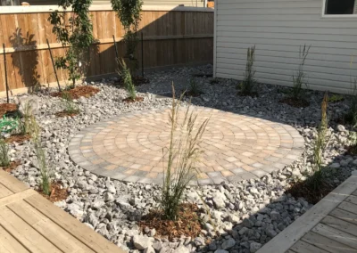 stone decoration in a backyard by Lush Landscaping