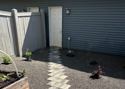 Stone walkway in backyard built by Lush Landscaping in Edmonton