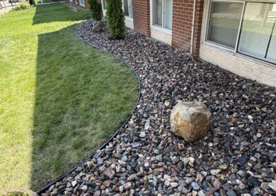 gravel and rocks around an apartment complex