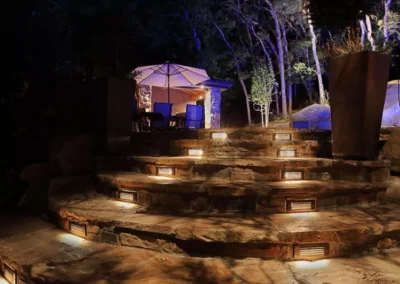 lighting around outdoor steps in a backyard garden